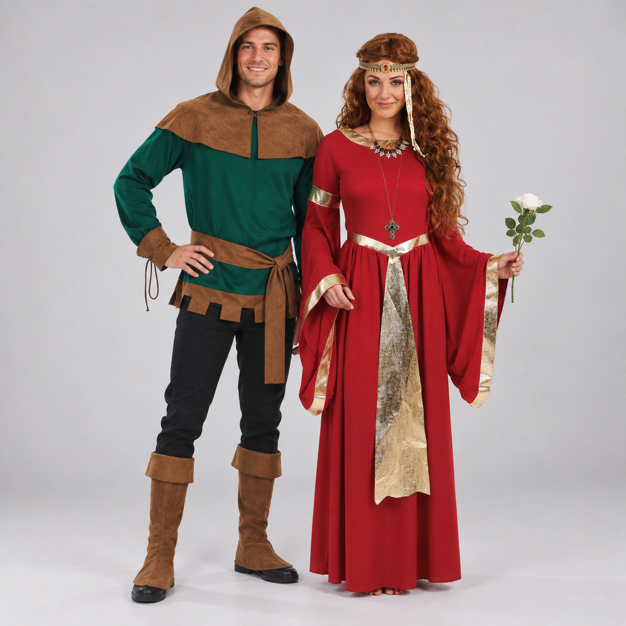 A couple in matching Sherwood Forest outlaw and medieval red dress costumes